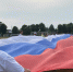 В Талдоме развернули 50-метровый триколор в День флага России - Единая Россия